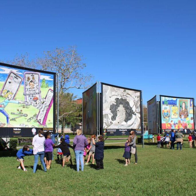 Students from the Pinellas County School District take a tour of the 2024 Embracing Our Differences exhibition (2) (1)